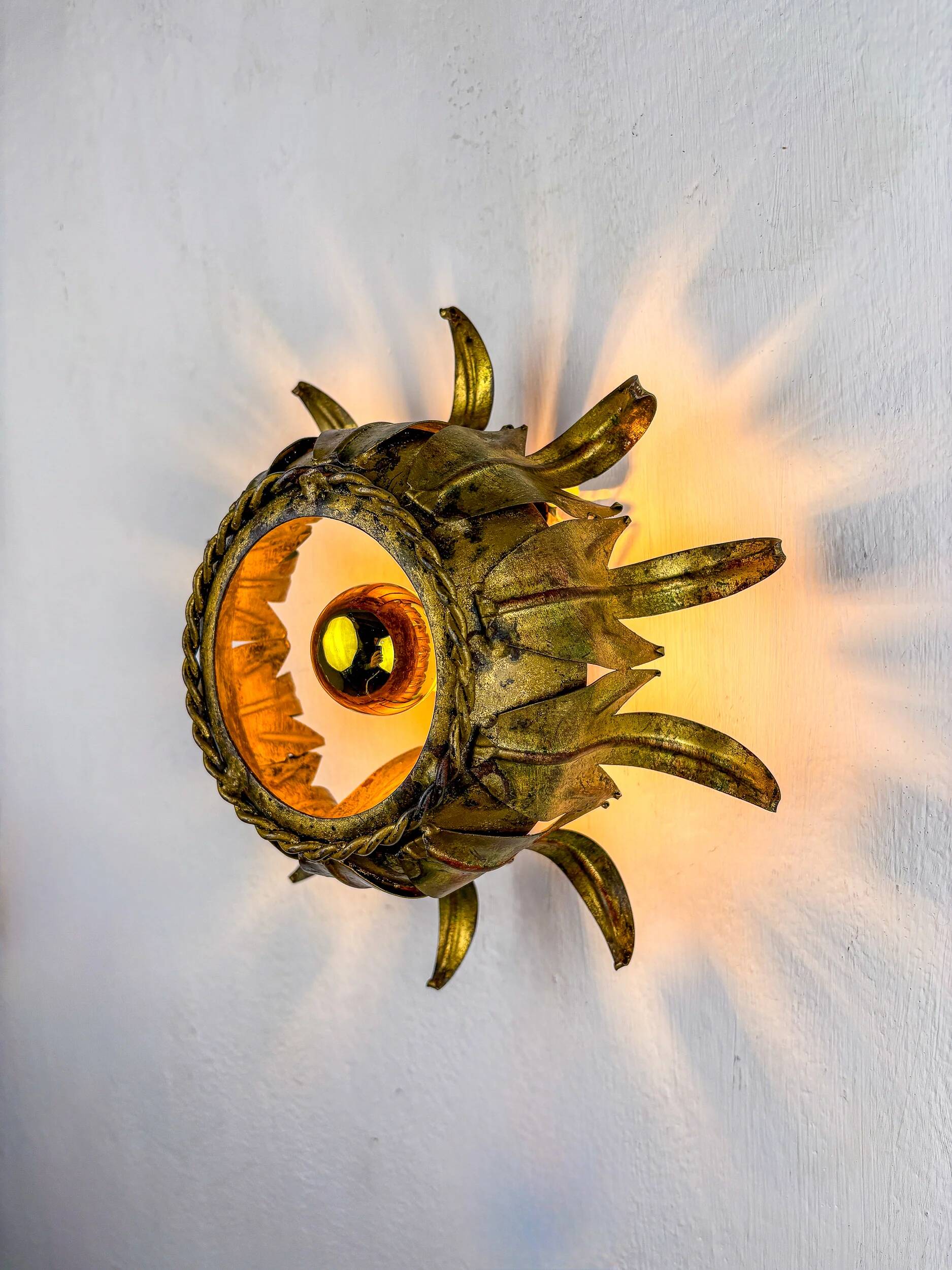 Sunburst ceiling light fixture or sconce in gilt wrought iron, Spain, 1960s