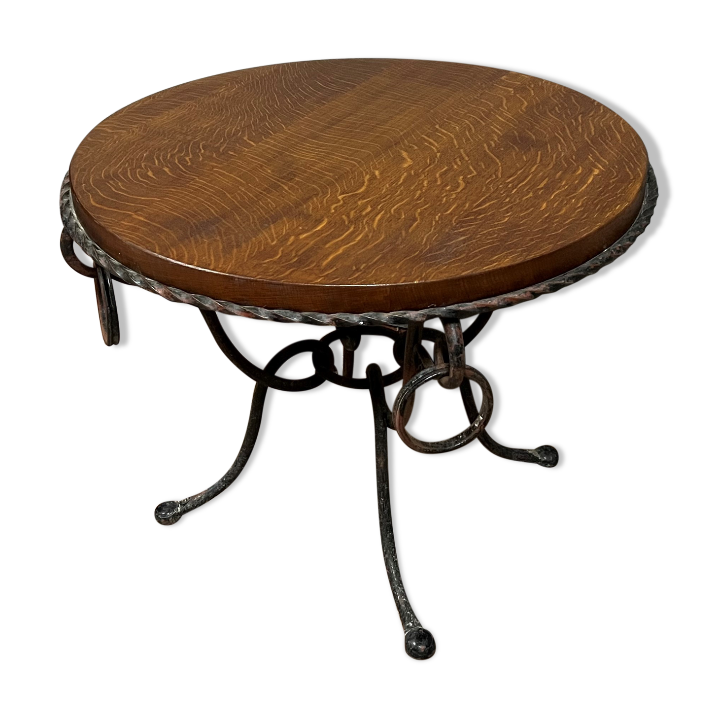 Hammered iron coffee table with circular wooden top
