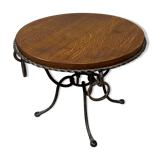 Hammered iron coffee table with circular wooden top