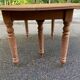Round extendable banquet table stripped in solid mahogany with 4 extensions, 19th century.