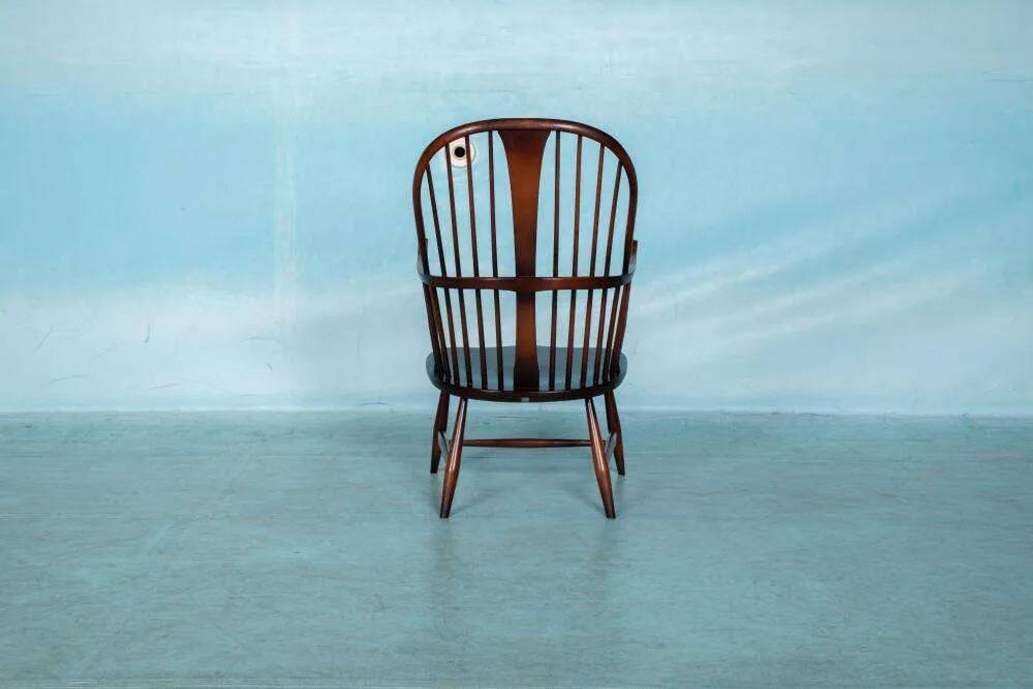 Ercol model 472 fireplace chair from the 1960s in beech.