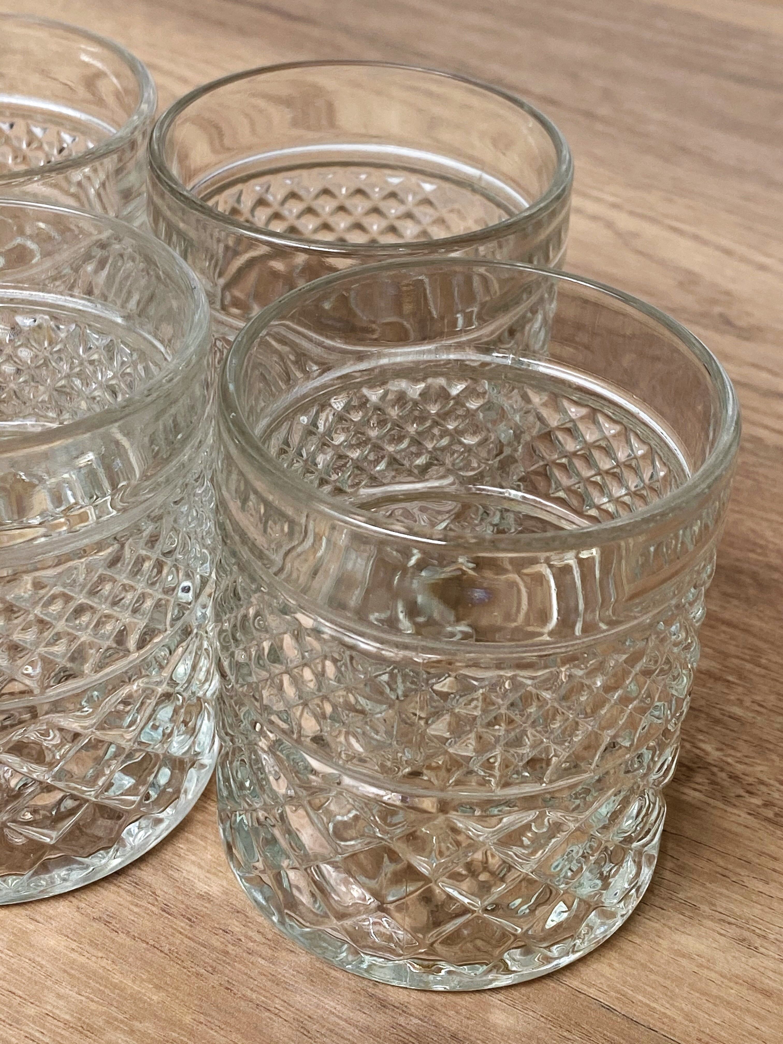 4 glasses with Whisky