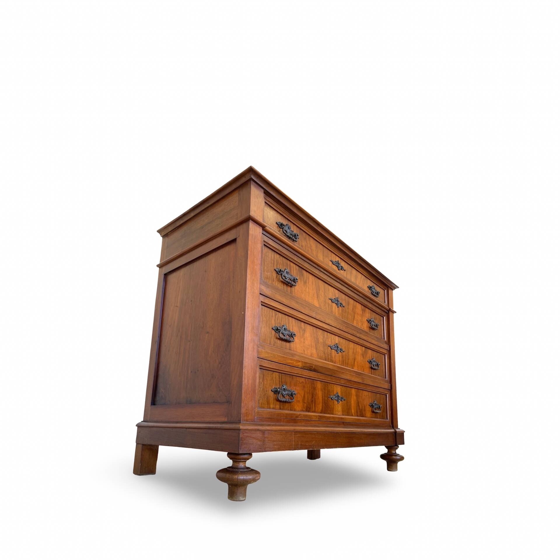 Antique walnut commode with bronze handles in the shape of a lion's mask,