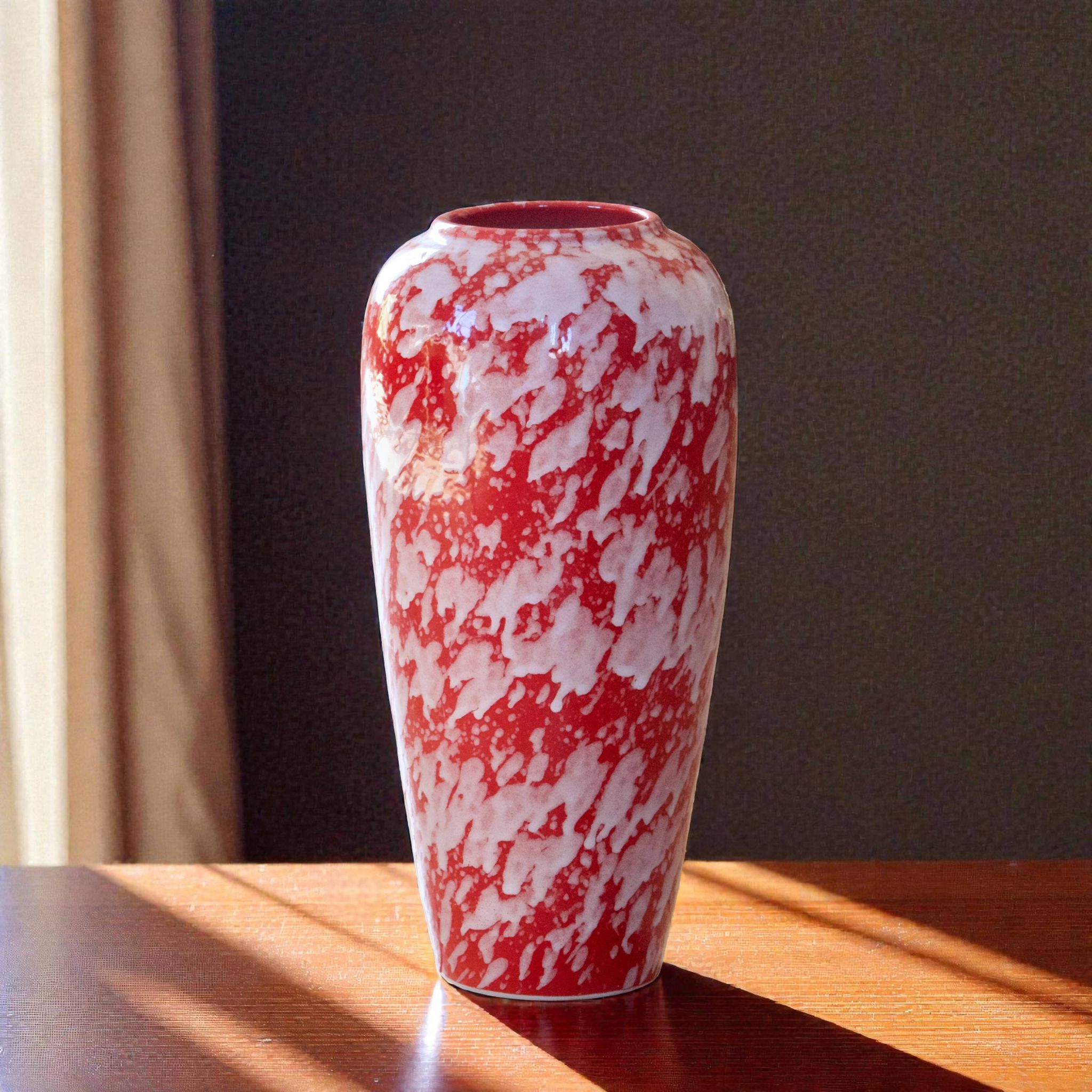Large handcrafted vase in red speckled glazed ceramic.