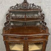 Vitrine galbée époque Napoléon III en acajou