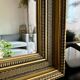 Large antique beveled mirror in the Napoleon III style - Gold and black frame