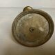 Brass sunburst candle holder