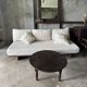 Coffee table, round antique Indonesian teak table with straight legs.
