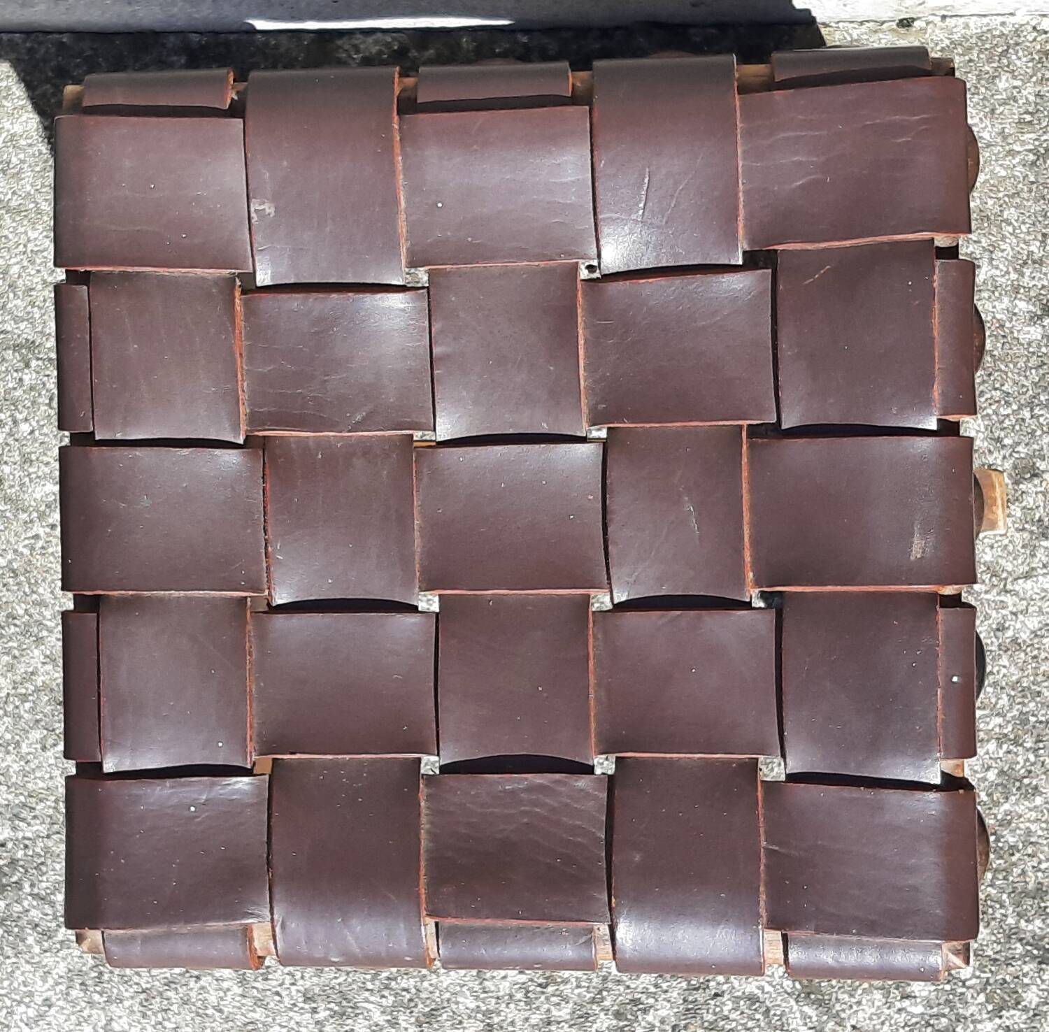 Pair of brutalist stools, leather seat.