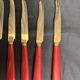 Tableware, twelve vermeil dessert knives in a case from around 1940.