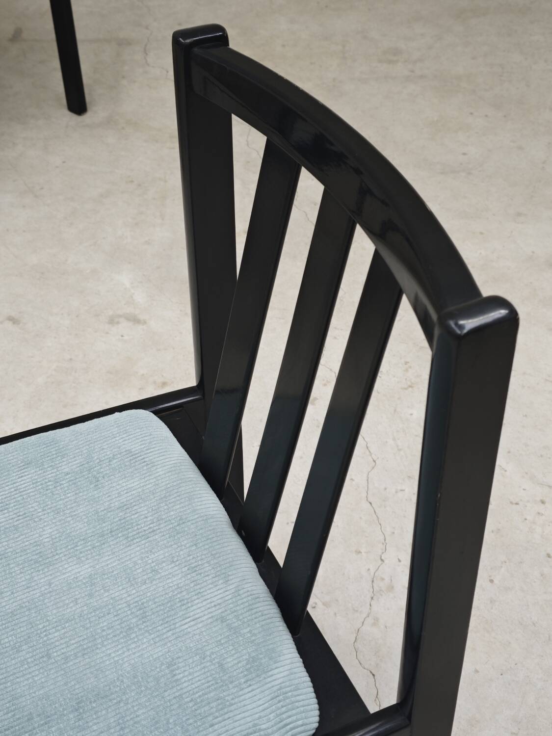 Set of 4 modernist black chairs with light blue ribbed fabric