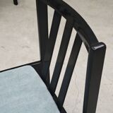 Set of 4 modernist black chairs with light blue ribbed fabric