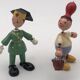 Set of 2 vintage GOULA wooden toy figurines with spring.