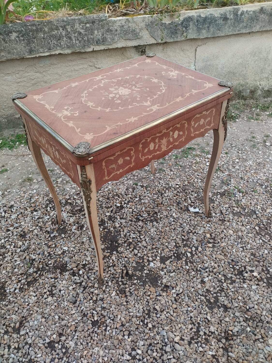 Antique game table in Louis XVI style with marquetry.