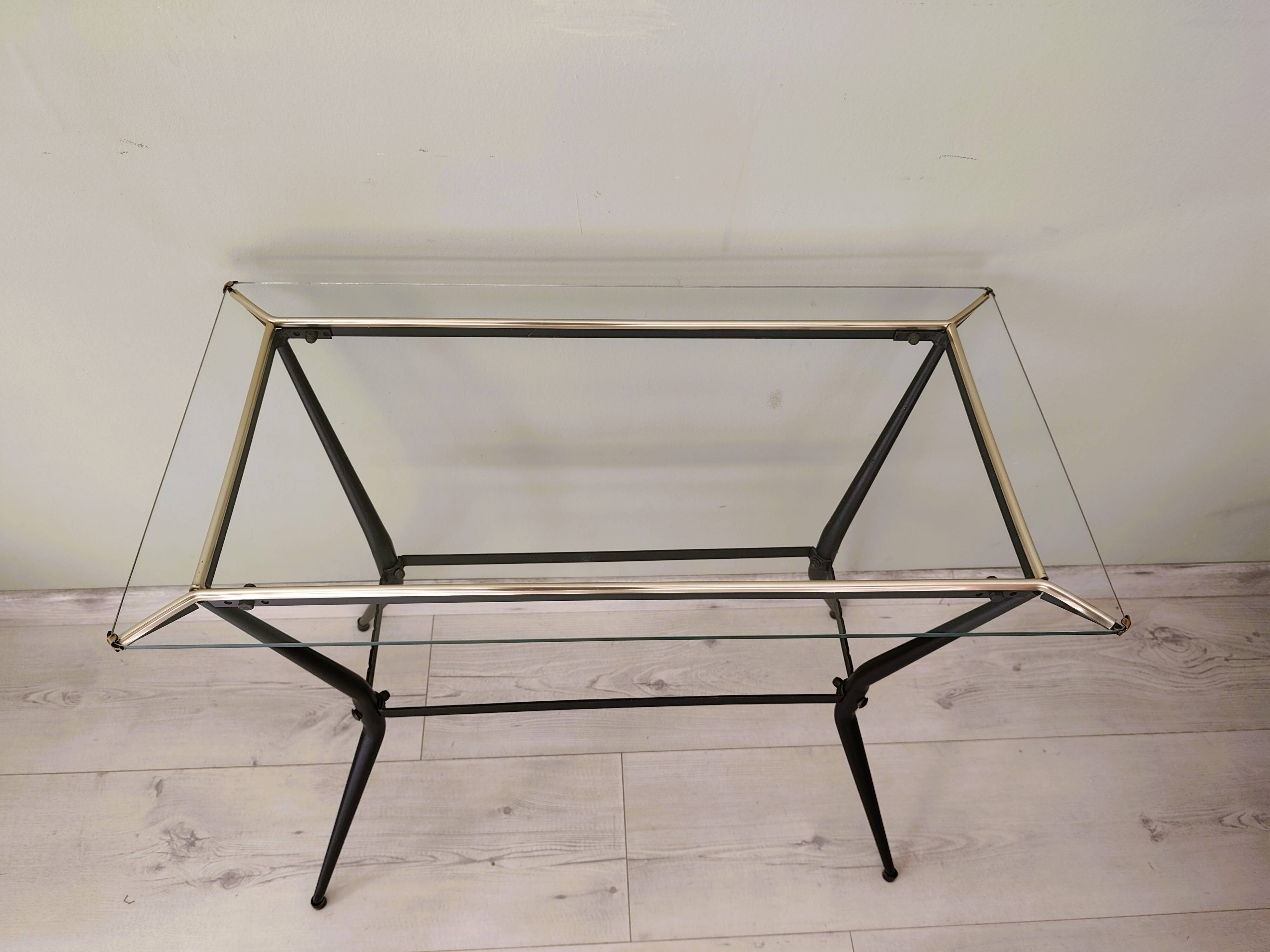 Antique side table made of metal and glass