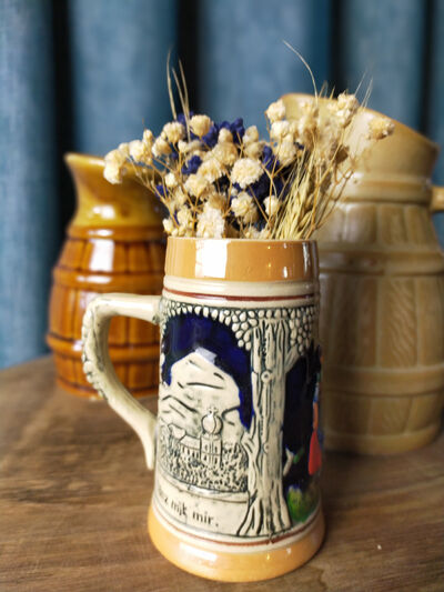 Two pitchers and a small original king beer mug