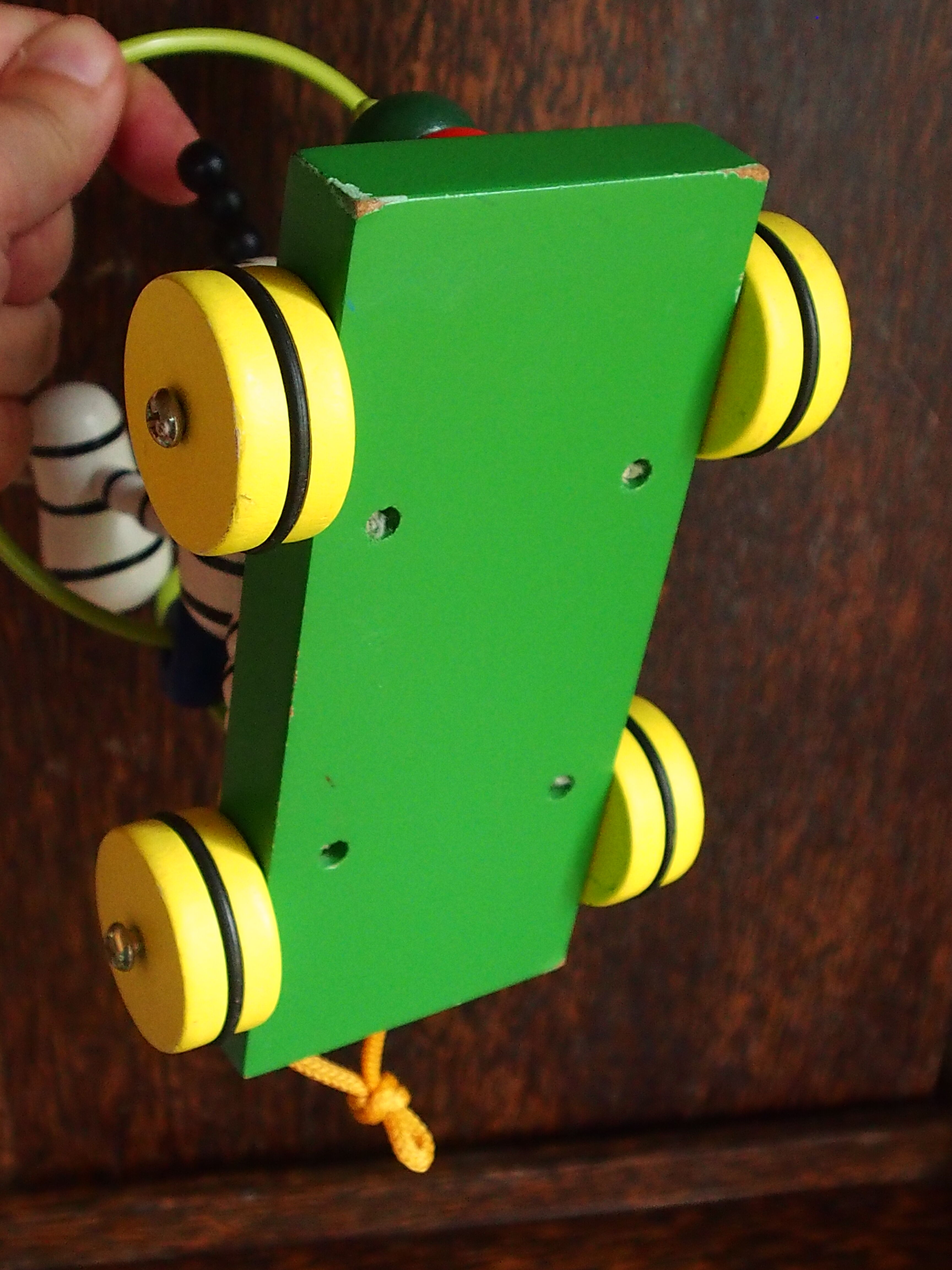 Old wooden toy, zebra car, to pull and push