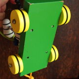 Old wooden toy, zebra car, to pull and push