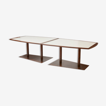 Brutalist conference table made of wood and steel