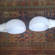 Pair of wall lights from the 1950s in porcelain.