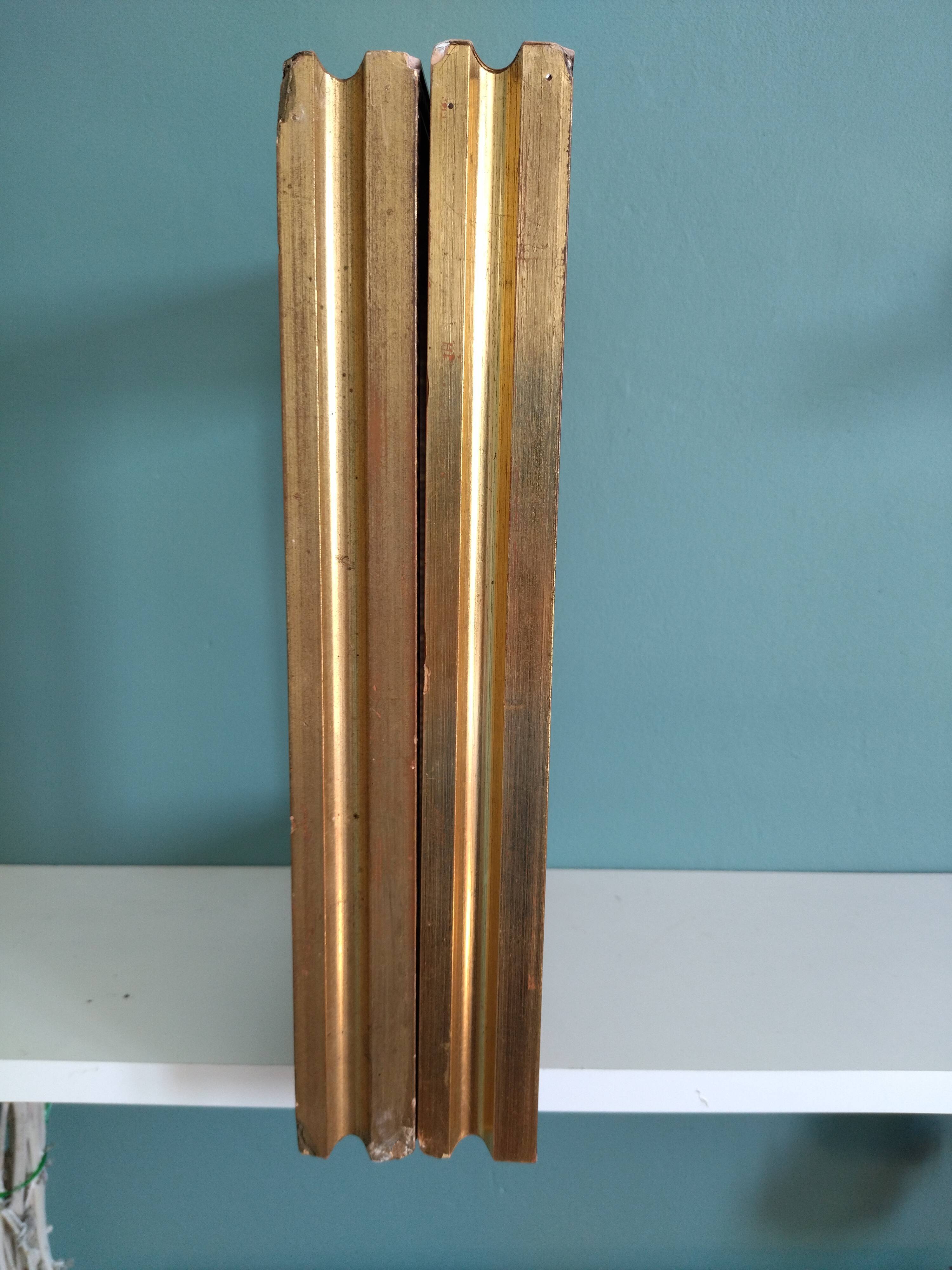 Pair of frames in old carved wood