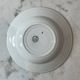 Set of 4 deep plates from Saint Amand with laurel wreath decoration.