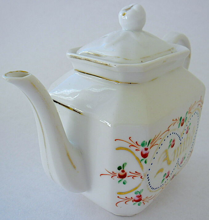 Rectangular teapot in Paris porcelain captioned "Friendship"