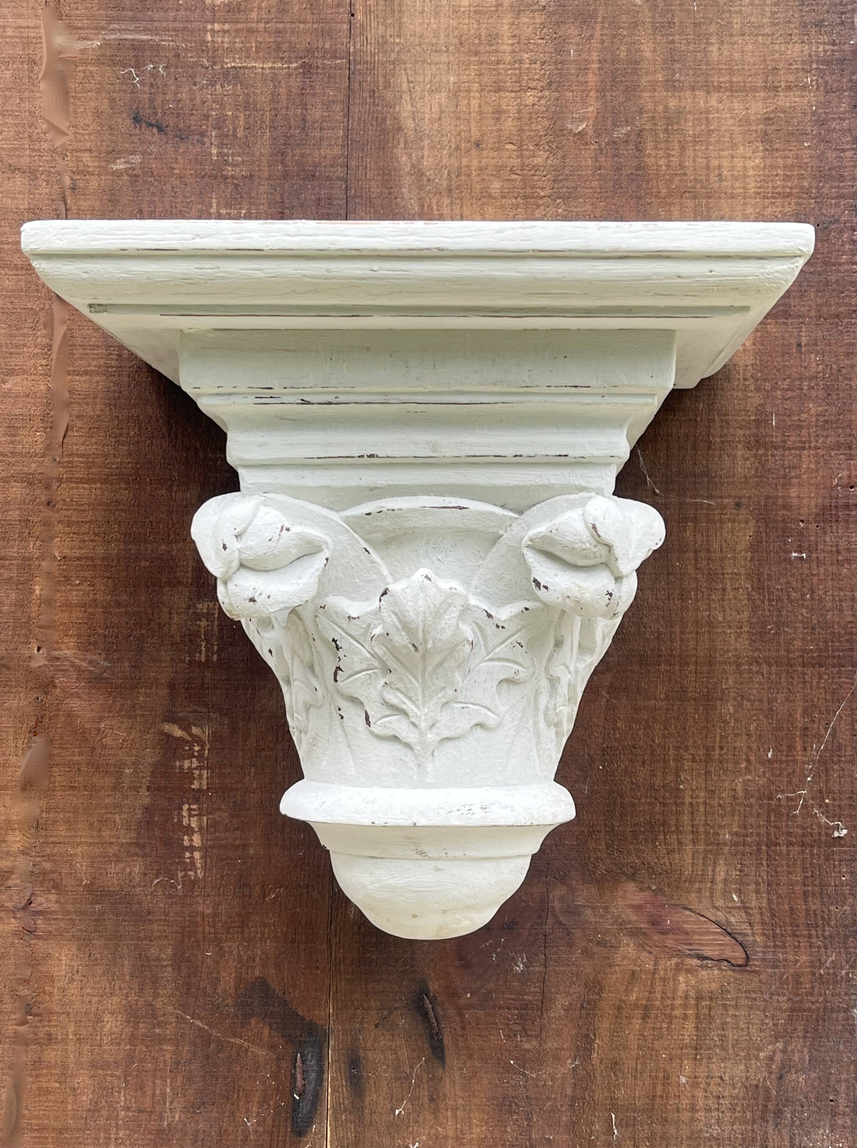 Carved wooden wall bracket