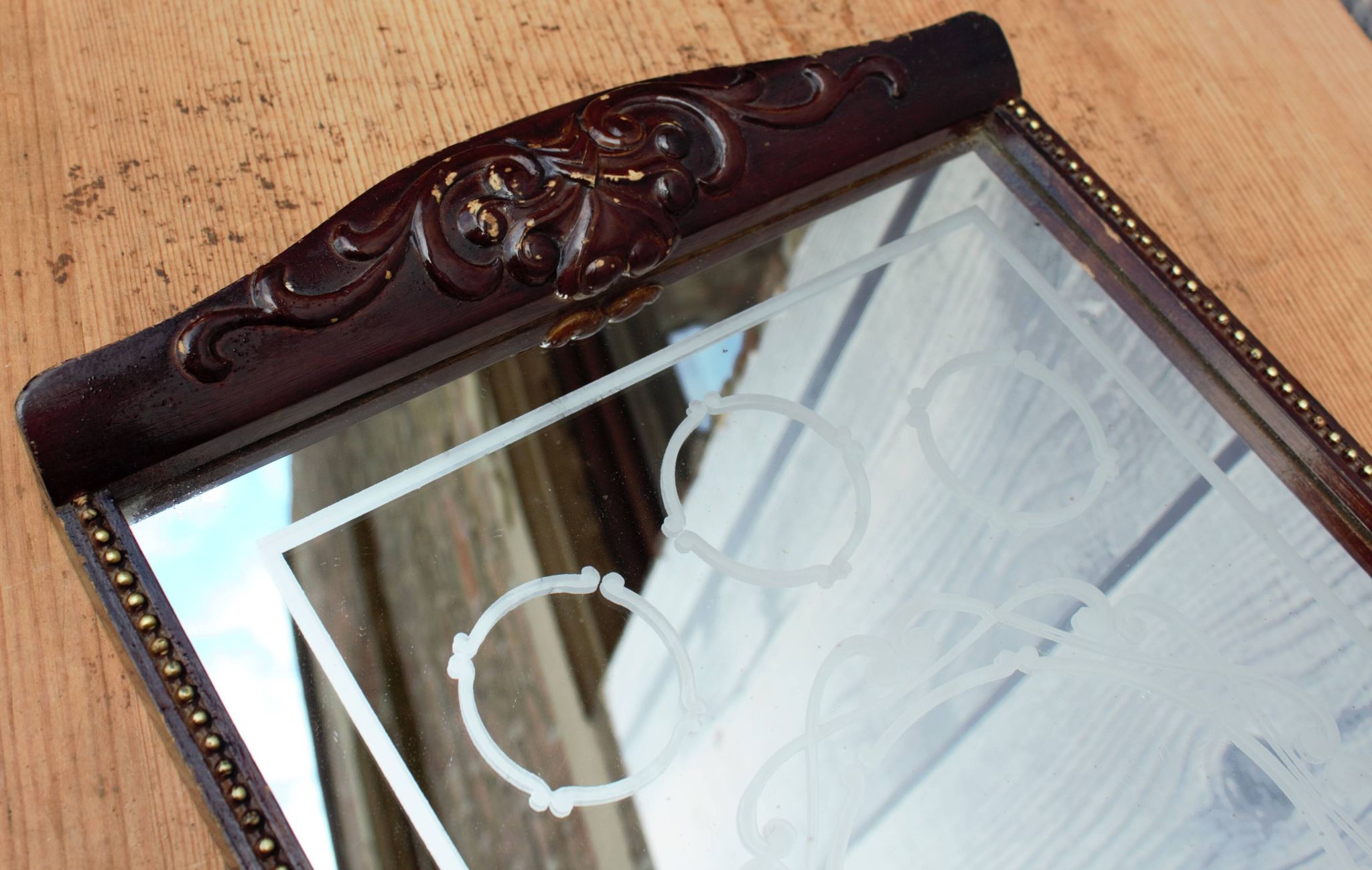 Old wooden tray with sandblasted mirror