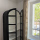 Black woven wood display cabinet
