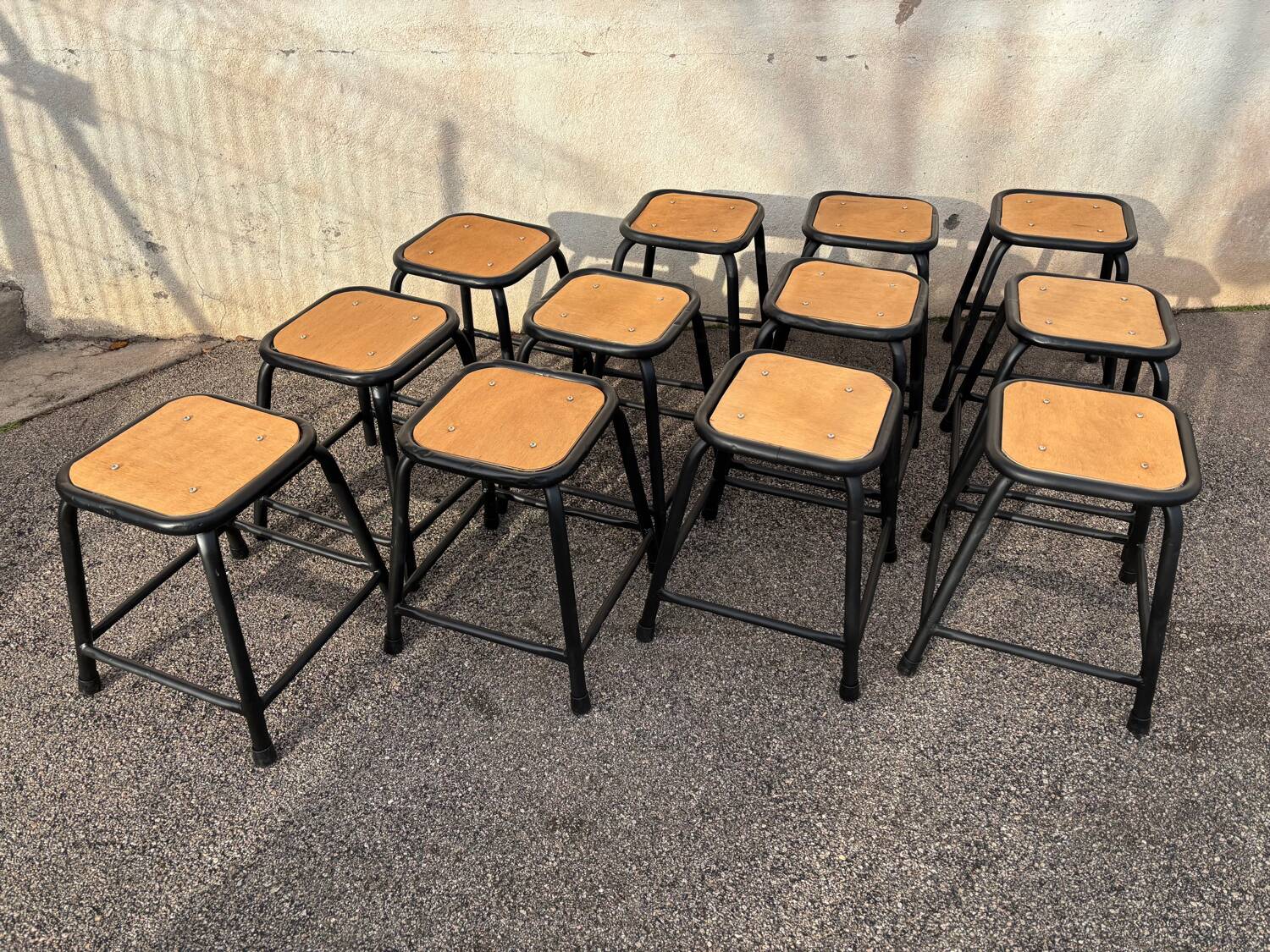 Set of 12 black industrial stools