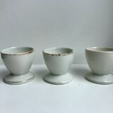 Trio of white shells bordered gold 50s