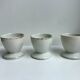 Trio of white shells bordered gold 50s