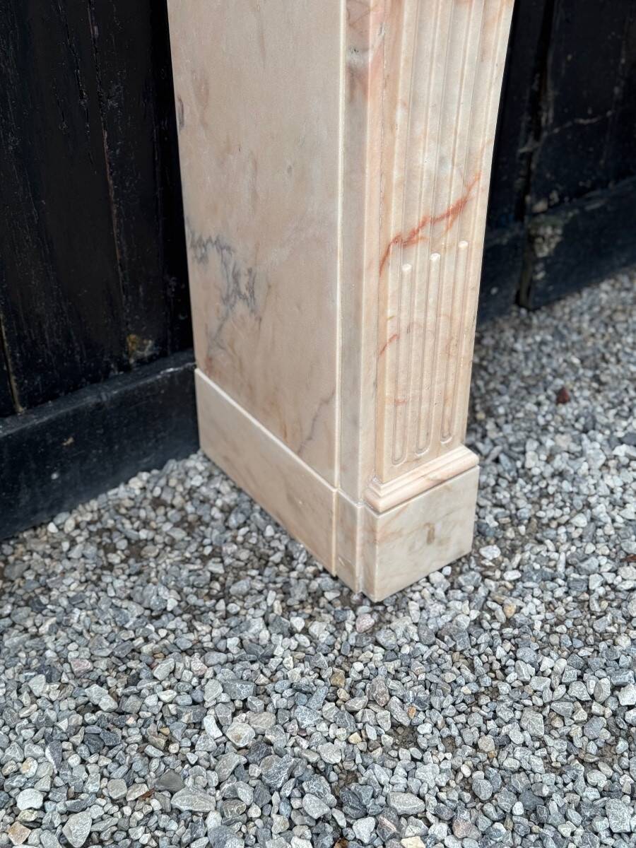 Louis XVI style fireplace in pink marble, circa 1920