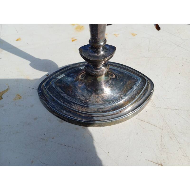 Pair of silver-plated metal candlesticks