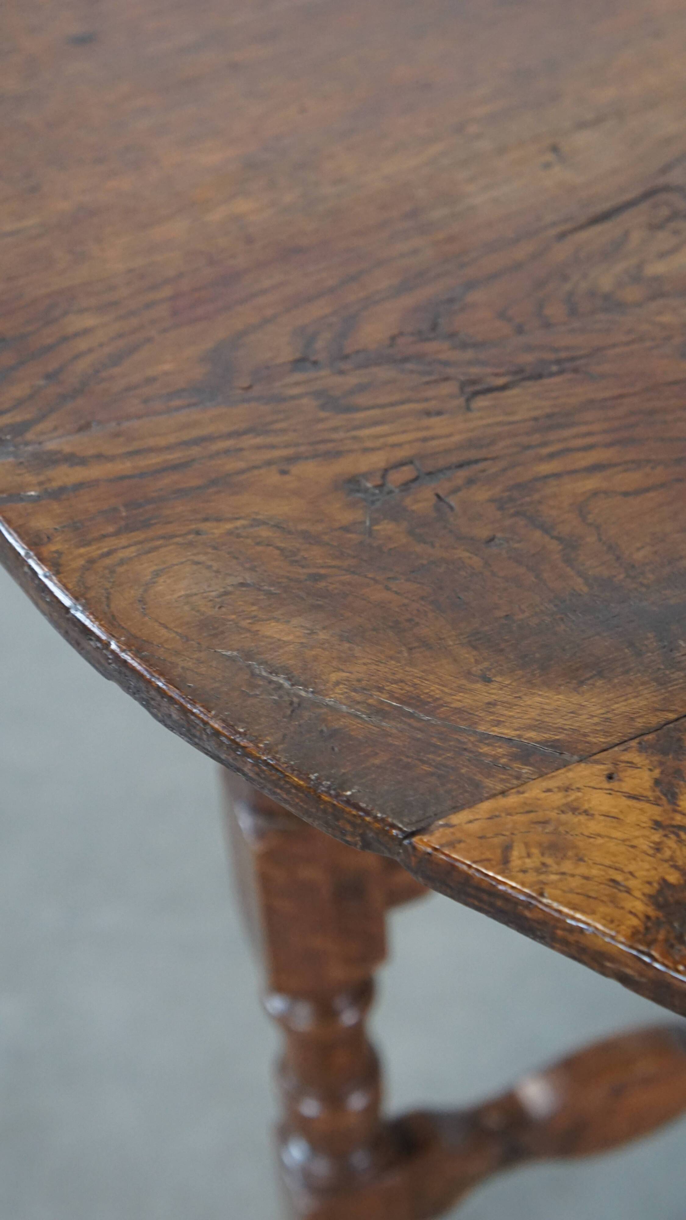 Round, folding antique 18th-century French wine/country table