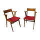 Pair of wooden armchairs and skaï foot compass of the 50s