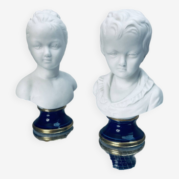 Pair of Brongniart children's busts in biscuits