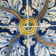 Panel of four Catalan tiles, 17th century, framed.