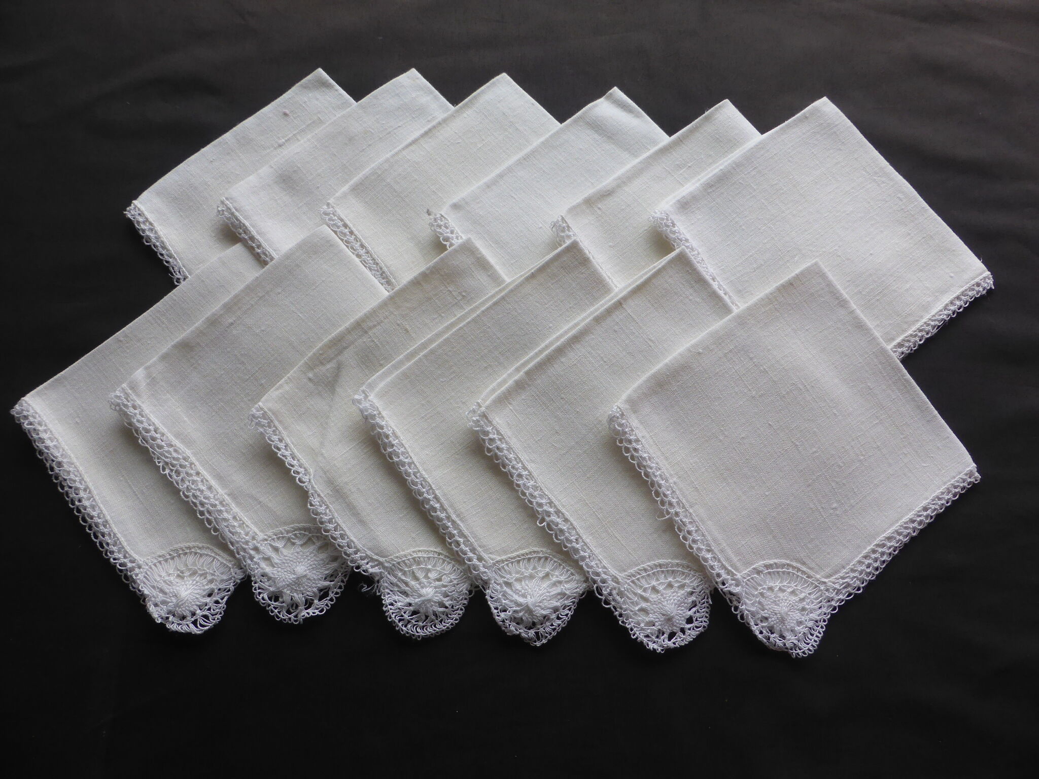 12 antique cocktail towels in off-white linen lined with lace