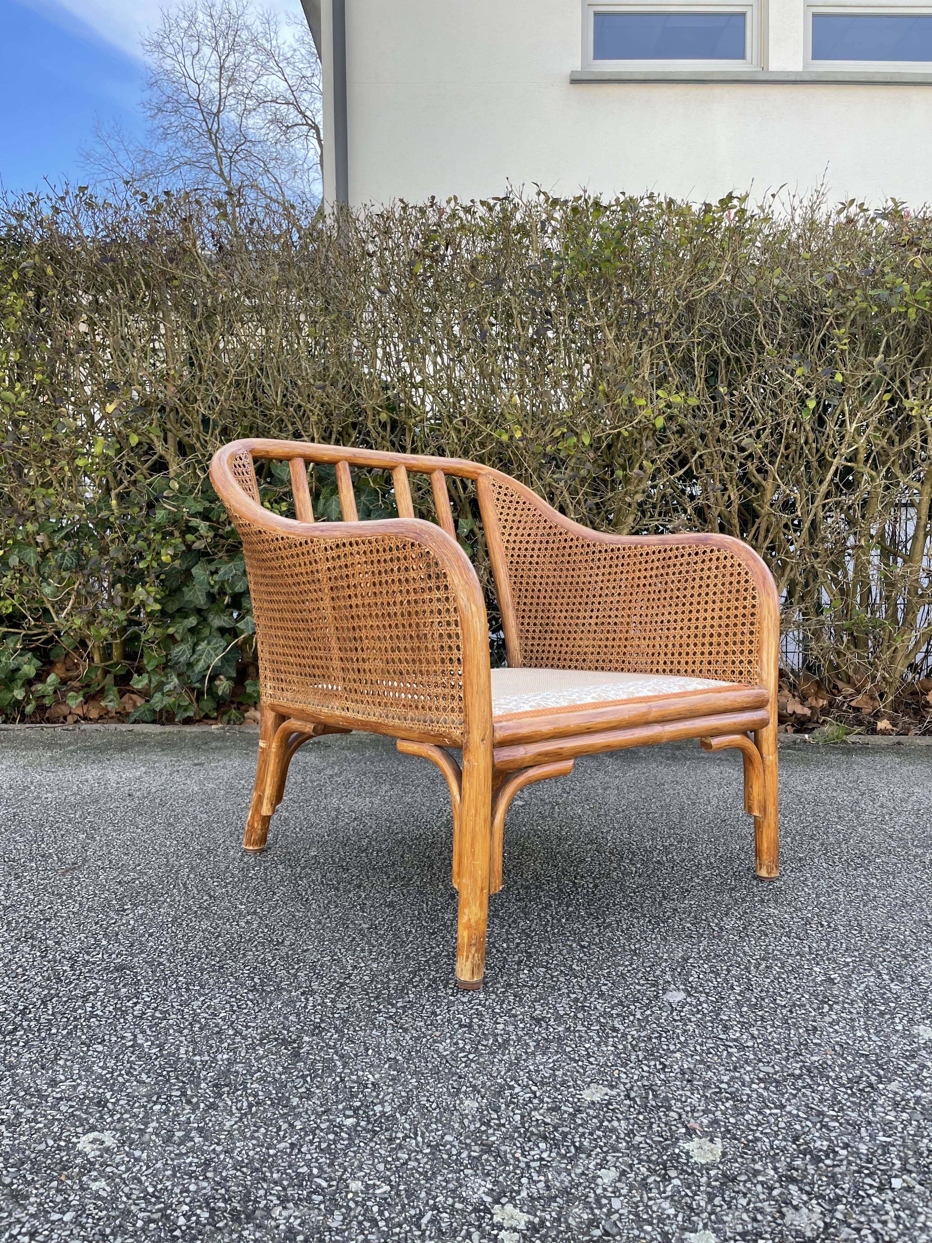 Paire de fauteuils en rotin et cannage