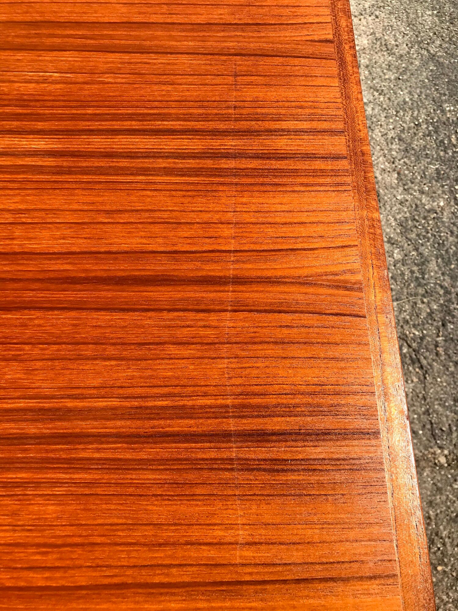 Extendable dining table with vintage 60s teak extensions
