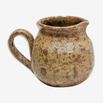 Vintage pitcher in pyrite sandstone