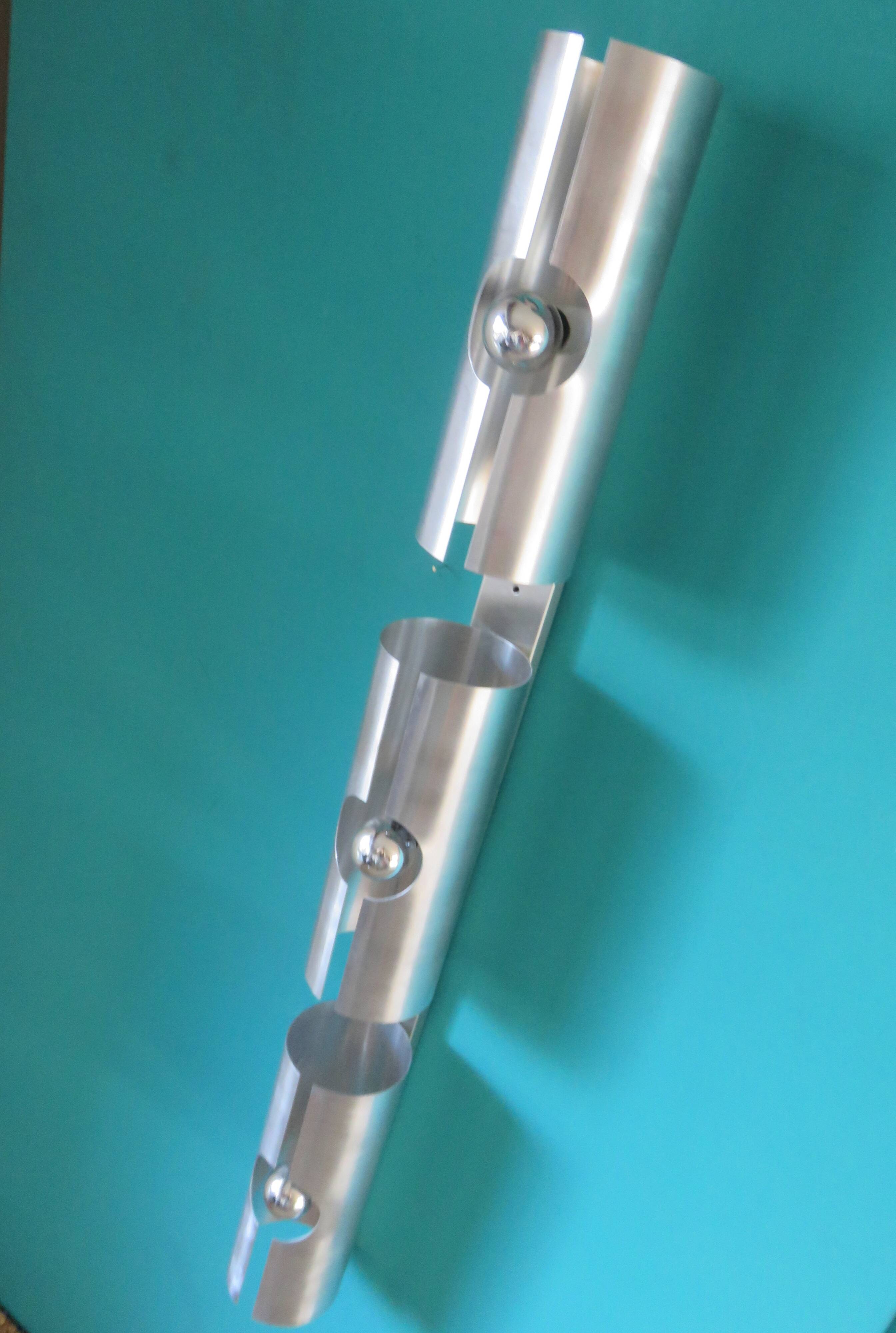 Long "SpaceAge" wall lamp in brushed aluminum. France 1970