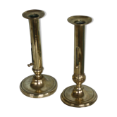 Pair of brass push-up candlesticks