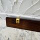 Vintage wooden and brass coat rack with 3 hooks from the 1960s.