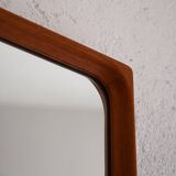 Vintage half-bust mirror with wooden frame