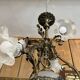 19th century brass and bronze chandelier, Napoleon III, illuminated by 6 tulips and a central globe
