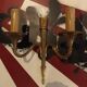 Pair of golden metal candlestick wall lamps