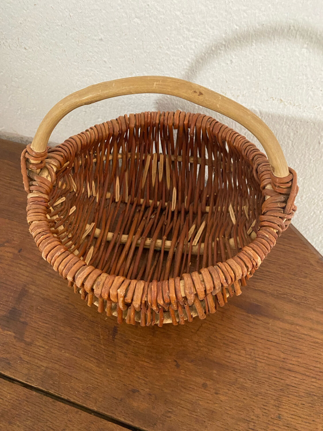 Small handmade basket made of hazel wood.